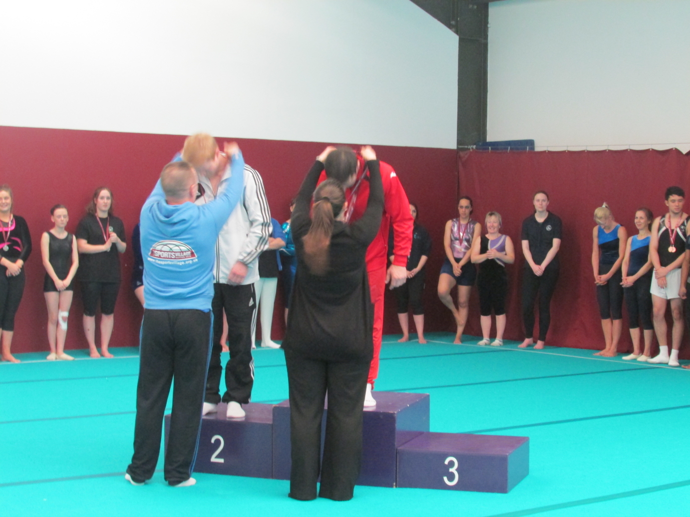 coach Stef - Elite Gymnastics Club, has won a Gold medal