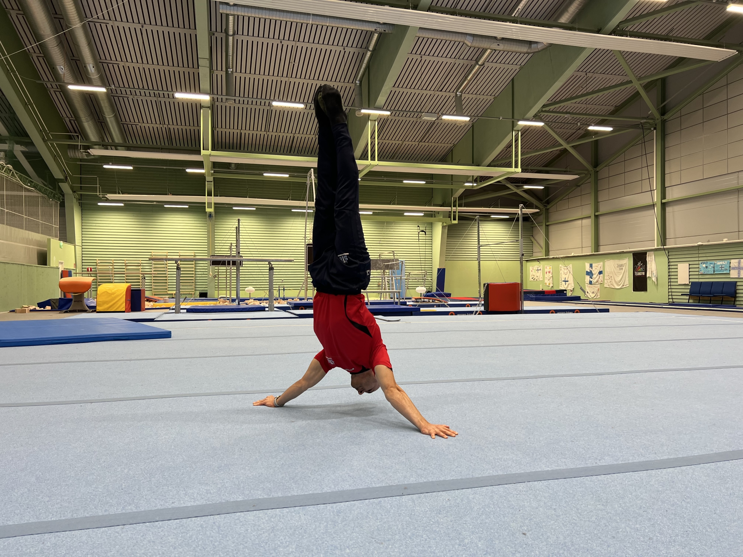 Stefan Kolimechkov performing the Japanese handstand at the Gymnastics Centre in Vierumaki, Finland